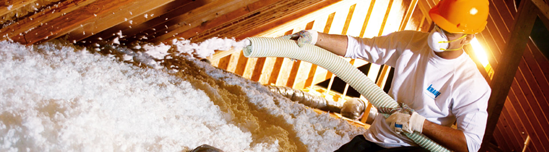 Insulation being sprayed in a home